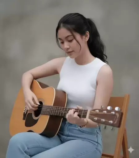 Kadın Plays Acoustic Guitar